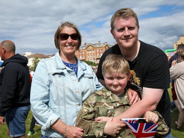 Sue Philbin and Matt Roff with Matt's son, Toby, 8. Portsmouth's Armed Forces Day, Southsea CommonPicture: Chris  Moorhouse (080624-59)
