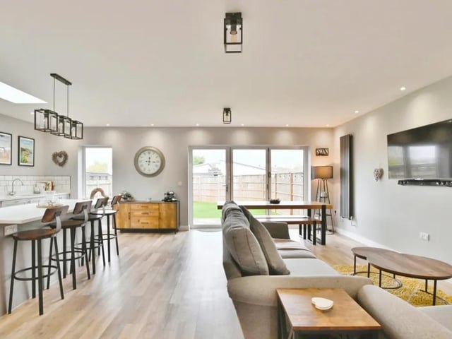 This property comes with five bedrooms, four bathrooms and three reception rooms as we as an open-plan kitchen, spacious garden and off-road parking.