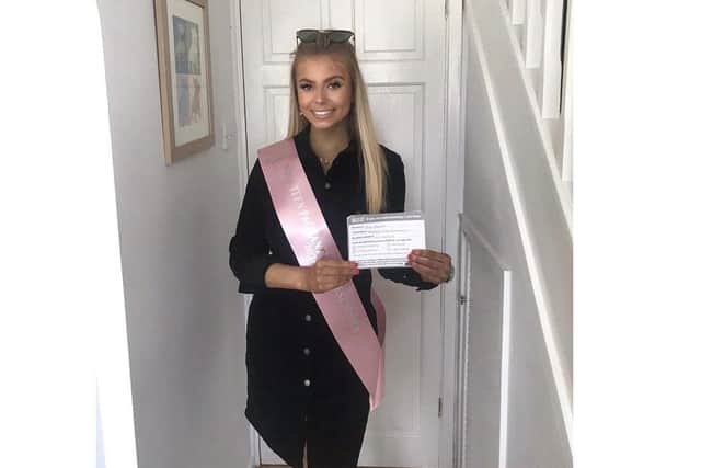 Cerys Hewson, 18 from Waterlooville, has been raising money for charities close to her heart ahead of competing for the title of Miss Teen Pageant Girl in August 2020. Pictured: Cerys handing out Covid-19 community support cards