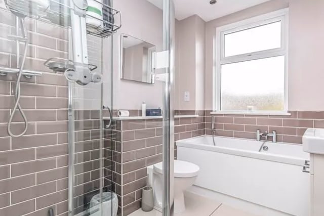 The listing says: "This excellently presented, extended end-of-terrace property has accommodation set over three inviting floors, with three bedrooms and a separate study room, making it an ideal family home."