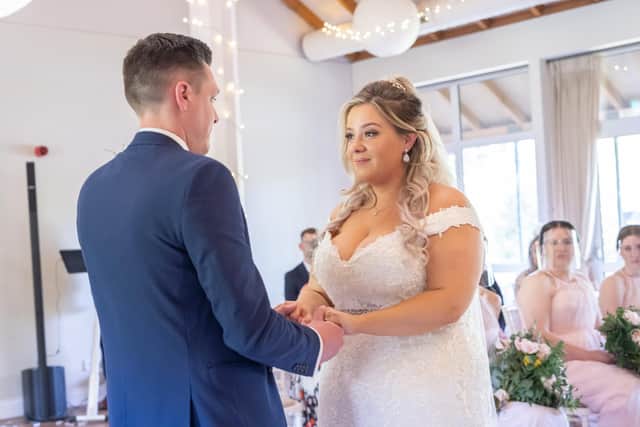 The couple exchanging vows. Picture: Carla Mortimer Photography,
carlamortimerweddingphotography.co.uk.