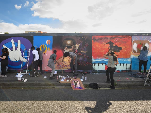 Pictured is: One of the many artists at wok in Wiltshire Street and Meridian RoadPicture: Keith Woodland (140921-88)