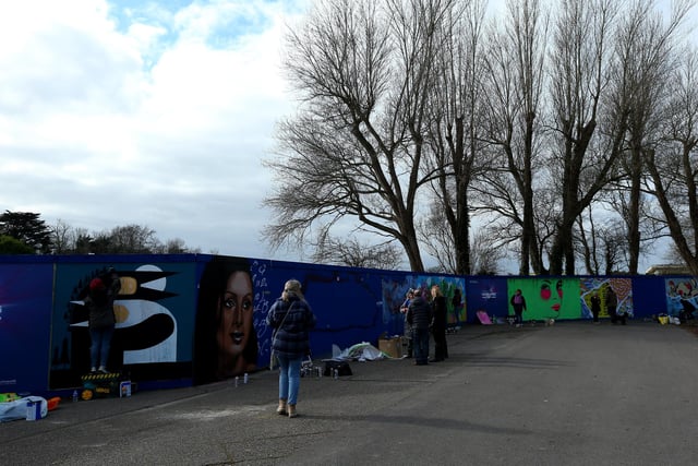 Local artists working on the wall behind Hilsea Lido. Picture: Chris Moorhouse (jpns 250223-)