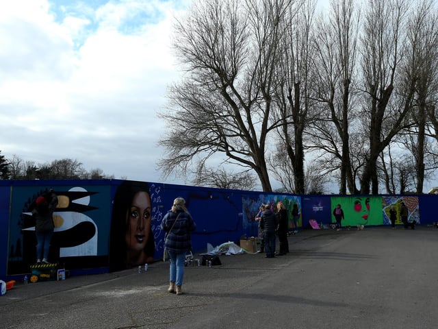 Local artists working on the wall behind Hilsea Lido. Picture: Chris Moorhouse (jpns 250223-)