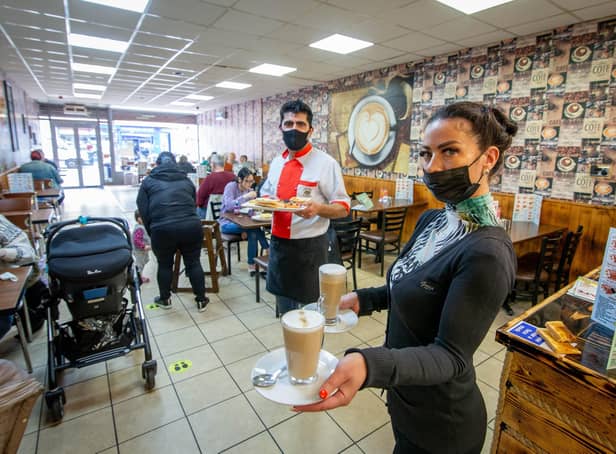 Staff Shagl Osman and manager Khaled Sleman excited to serve indoors in cafe Nut, North End, Portsmouth. Picture: Habibur Rahman