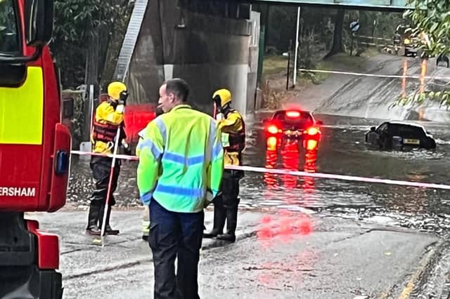 Emergency Services attending dangerous flood in Amersham