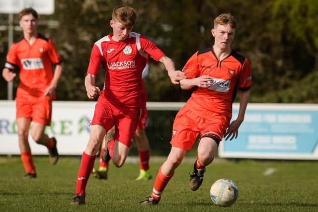 AFC Portchester (orange) v Horndean White U18s
Picture: Keith Woodland