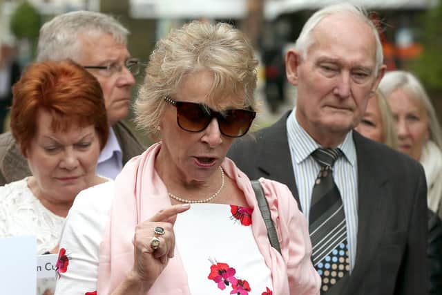 Ann Reeves, centre, is the daughter of Elsie Devine who died at the Gosport War Memorial Hospital. Pictured at Portsmouth Cathedral on June 20 in 2018 when the Gosport Independent Panel report was released. Picture: Chris Moorhouse