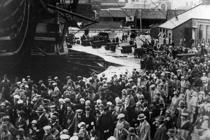 Crowds around the bows of HMS Victory at Navy Days, probably 1928.