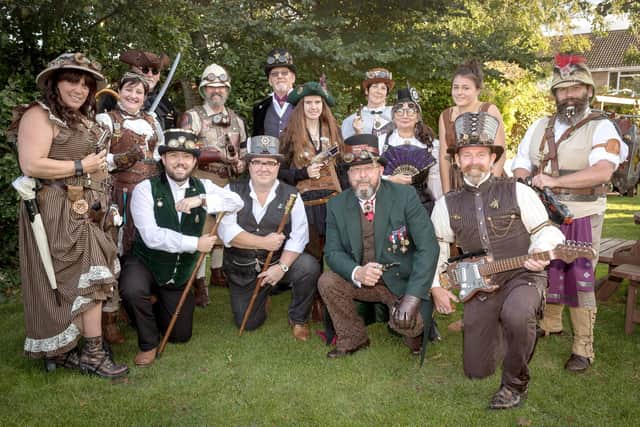 Members of the Gosport Steampunk Society gather outside the fighting Cock Pub. 
Picture Credit: Keith Woodland
