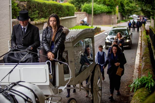 Funeral of Stephen Harrington at All Saints Church , Horndean on Wednesday 5th October 2022
Pictured: Procession leading up to All Saints Church, Catherington Lane, Horndean with Stephen's daughter, Mary-Lou on the Horse Drawn Hearse
Picture: Habibur Rahman