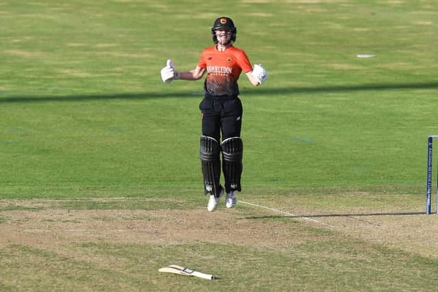 Emily Windsor  of Southern Vipers celebrates hitting the winning run during the Rachael Heyhoe-Flint Trophy final. Photo by Tony Marshall/Getty Images.