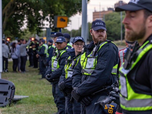 Policing the Anti-immigration protest near the UK Border Agency Building in Portsmouth. Picture: Mike Cooter (070824)