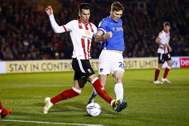Sean Raggett must serve a one-match ban following his booking at Lincoln. Picture: Daniel Chesterton/phcimages.com