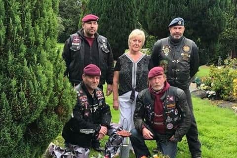 The riders visit a memorial as they raise awareness of their chosen charity