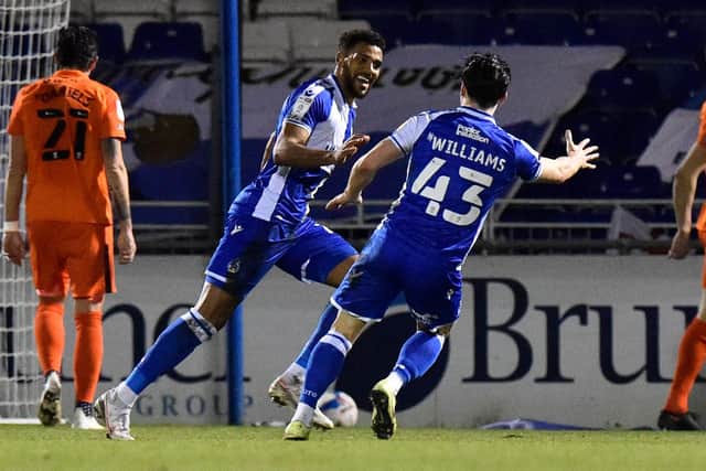 Jonah Ayunga celebrates his second goal for Bristol Rovers against Pompey. Picture: Graham Hunt
