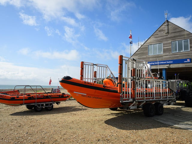 Pictured is: The two lifeboats stationed at Hayling are pushed out of the stationPicture: Keith Woodland