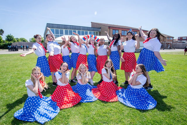 Dance students of Trafalgar School, Hilsea, Portsmouth celebrating outside their school