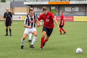 Locks Heath(red) in action during their 3-0  Hampshire Premier League loss to Hayling United at Westleigh Park last month. Photo by Matthew Clark