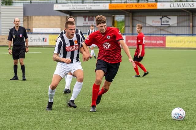 Locks Heath(red) in action during their 3-0 Hampshire Premier League loss to Hayling United at Westleigh Park last month. Photo by Matthew Clark