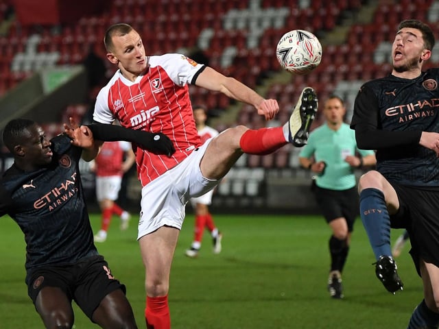 Pompey have already been linked with moving for the defender this summer, who is set to leave Cheltenham for free. The Blues are admirers of the centre-back and could move for his services if they fail to bring Carter back to the club. Picture: Shaun Botterill/POOL/AFP via Getty Images