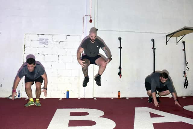 Exercises at Basecamp Gym in Hilsea
Picture: Sarah Standing (160123-8128)