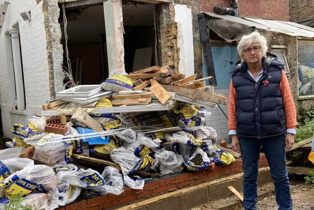 A devastated Tatiana Dent in front of her home