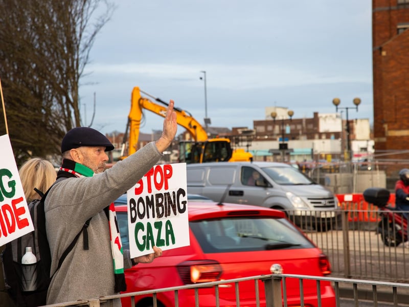 Demonstrators outside Unicorn Gate
Photos by Alex Shute
