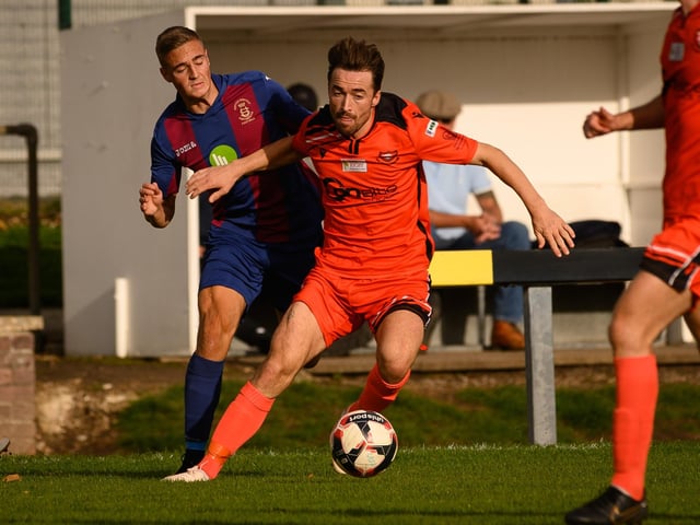 Portchester's Connor Bailey and USP's Dan Sibley. Picture: Keith Woodland