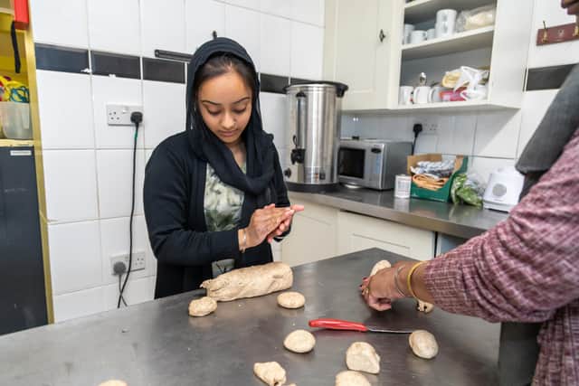 Sandeep Kaur (20) making pooris in the kitchen of the Guru Nanaksar Gurdwara in Margate Road. Picture: Mike Cooter (010522)