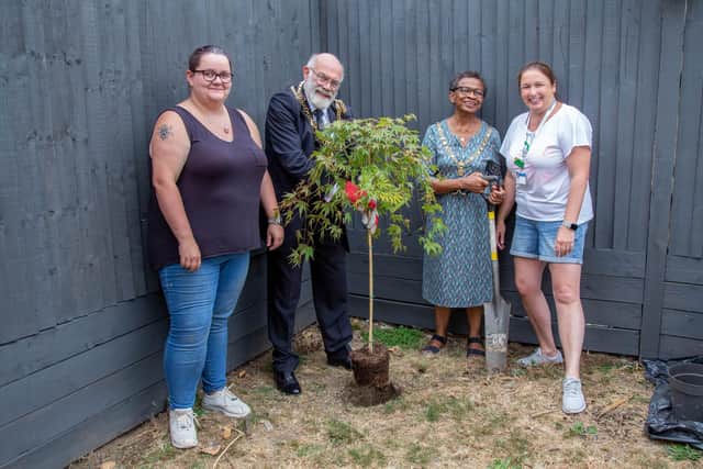 Jade Mead with Lord Mayor of Portsmouth, Dr Hugh Mason, the Lady Mayoress, Marie Costa, and Cheryl Head planting the time capsule. Picture: Habibur Rahman