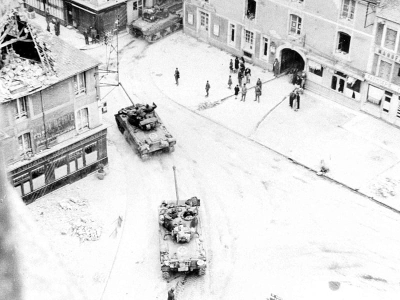Sherman tanks in La Deliverande 8/6/44 en-route to Caen