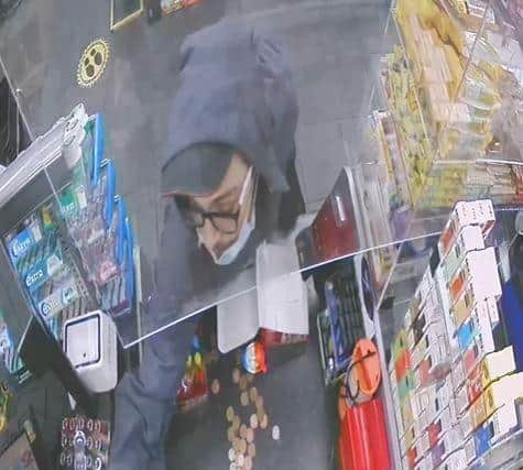 Police have released an image of the man who they wish to speak to. Staff at the Premier store, on Bury Road, were threatened with a meat cleaver and crossbow. Picture: Hampshire police.