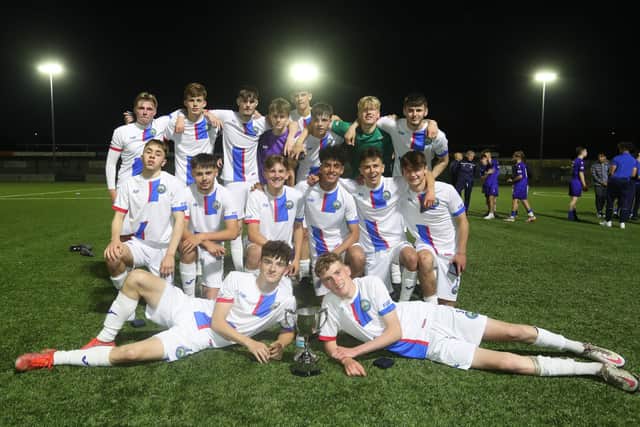 Gosport  Borough Under-18s celebrate their Hampshire Development League Cup final success. Picture: Dave Haines