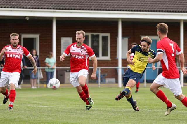 Jake Knight slots home the first of his two goals against Stockbridge. Picture: Chris Moorhouse