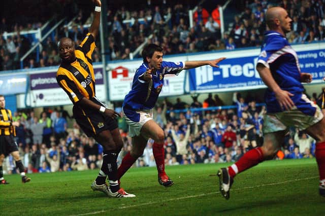 Svetoslav Todorov has just sent Pompey to the Premier League. Picture: Mick Young