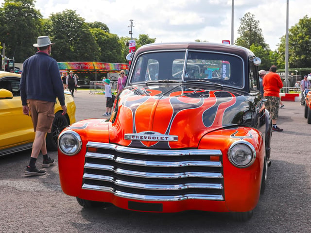Cars on display at the Custom and American Show