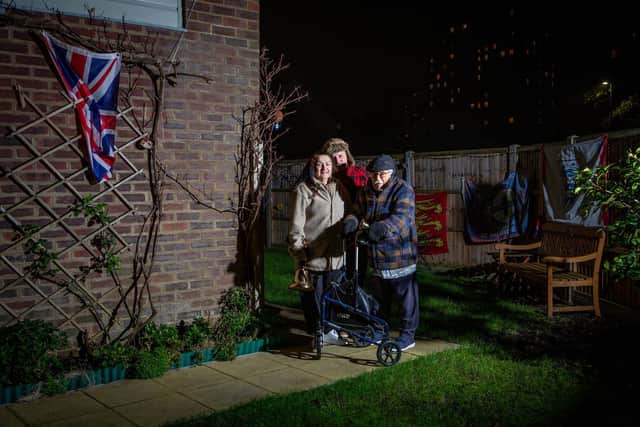 Joanne and David White with their father, John Castleton, 98 in their garden in Grover Street, Portsmouth celebrating Clap for Heroes by ringing their bells on 7 January 2020.
Picture: Habibur Rahman