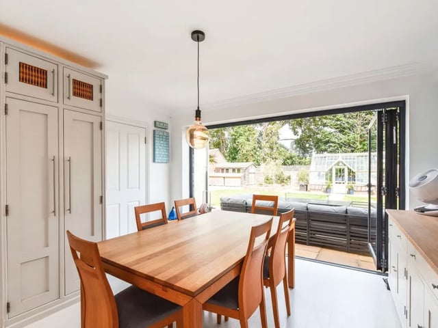 This property comes with five bedrooms,  four bathrooms and two reception rooms as well as a large garden and a swimming pool.