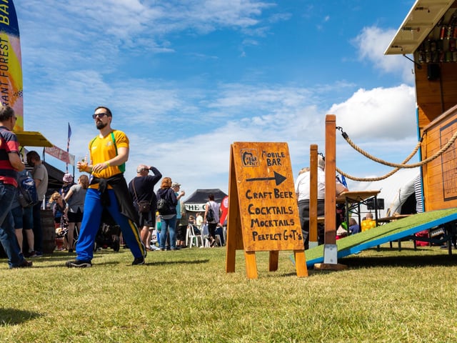 Festival goers enjoying the fantastic weather. Picture: Mike Cooter (210522)