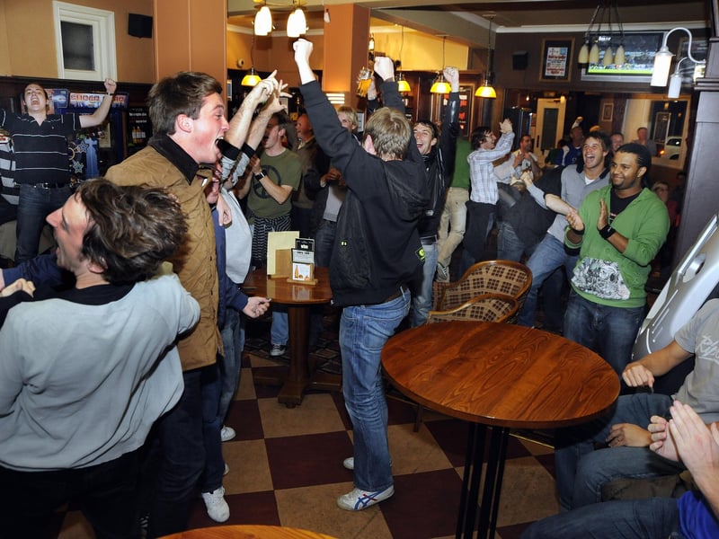 The Festing Pub goes wild as these fans celebrate Peter Crouch scoring against Guimaraes in the Uefa Cup in 2008.
