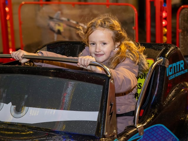 The crowds braved the wind and rain to watch the Christmas lights being switched on in Fareham highstreet on Saturday evening, while some of the entertainment was moved into the shopping centre.Pictured - Mabel, 5 from Fareham enjoying the ridesPhotos by Alex Shute