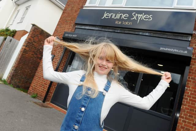 Rebekah Patis (10) from Waterlooville, had her haircut at Jenuine Styles in Waterlooville on Friday, October 23, and is donating her hair to the Little Princess Trust.

Picture: Sarah Standing (231020-6541)

