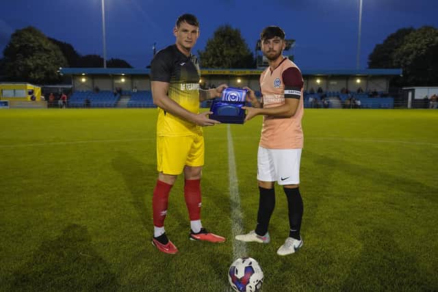Pompey skipper Jack Fox and his Royal Artillery counterpart ahead of the 125th Anniversary match. Picture: Jason Brown Photography
