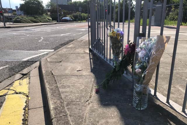 Flowers have been left near the scene of a fatal hit-and-run in Winston Churchill Avenue.