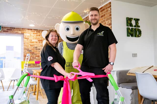 Lynette and Chris with MTLL mascot Larry