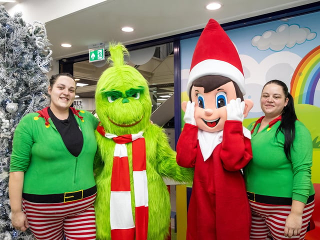 The staff at Wonder with the Elf and Grinch  Photos by Alex Shute