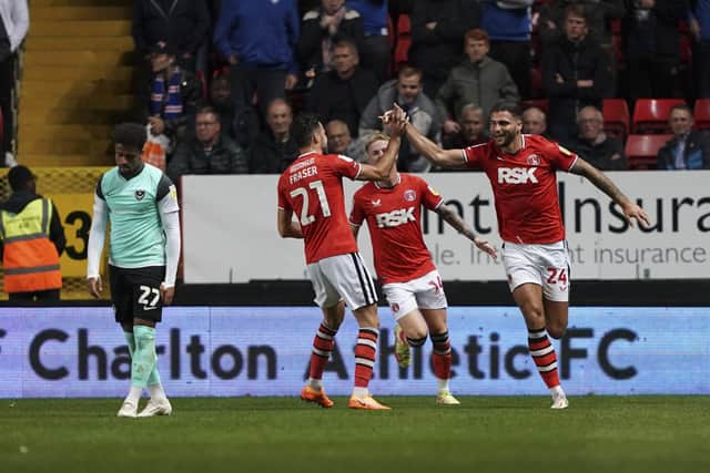 Josh Koroma is devastated after Ryan Inniss heads home Charlton's first against Pompey. Picture: Jason Brown/ProSportsImages