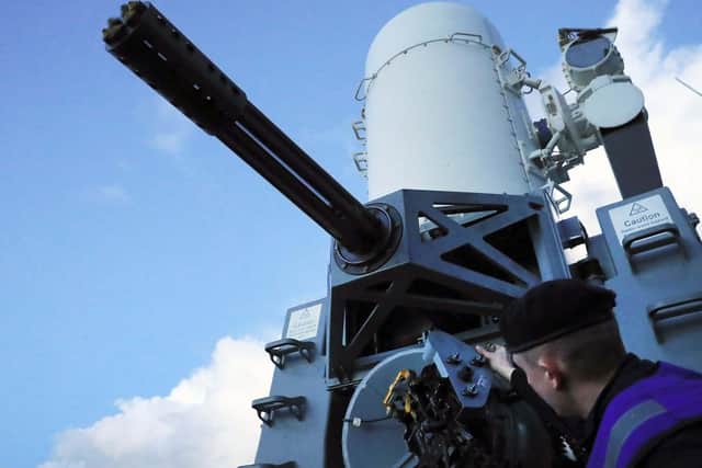 Pictured - Leading Engineering Technician (Weapons Engineering) Murton loading the Phalanx weapons system - on HMS Duncan in 2016.