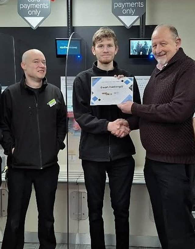 One of Enable Ability's 'Inter Activ' participants, receiving the 'Employee of the Year 2024' certificate